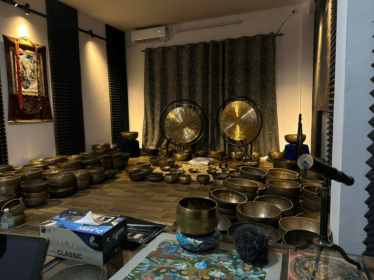 Meditation room with singing bowls and large gongs